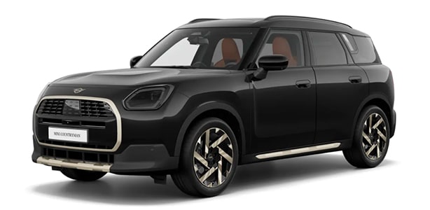 Schwarzer MINI Countryman mit LED-Scheinwerfern und silbernen Akzenten vor weißem Hintergrund