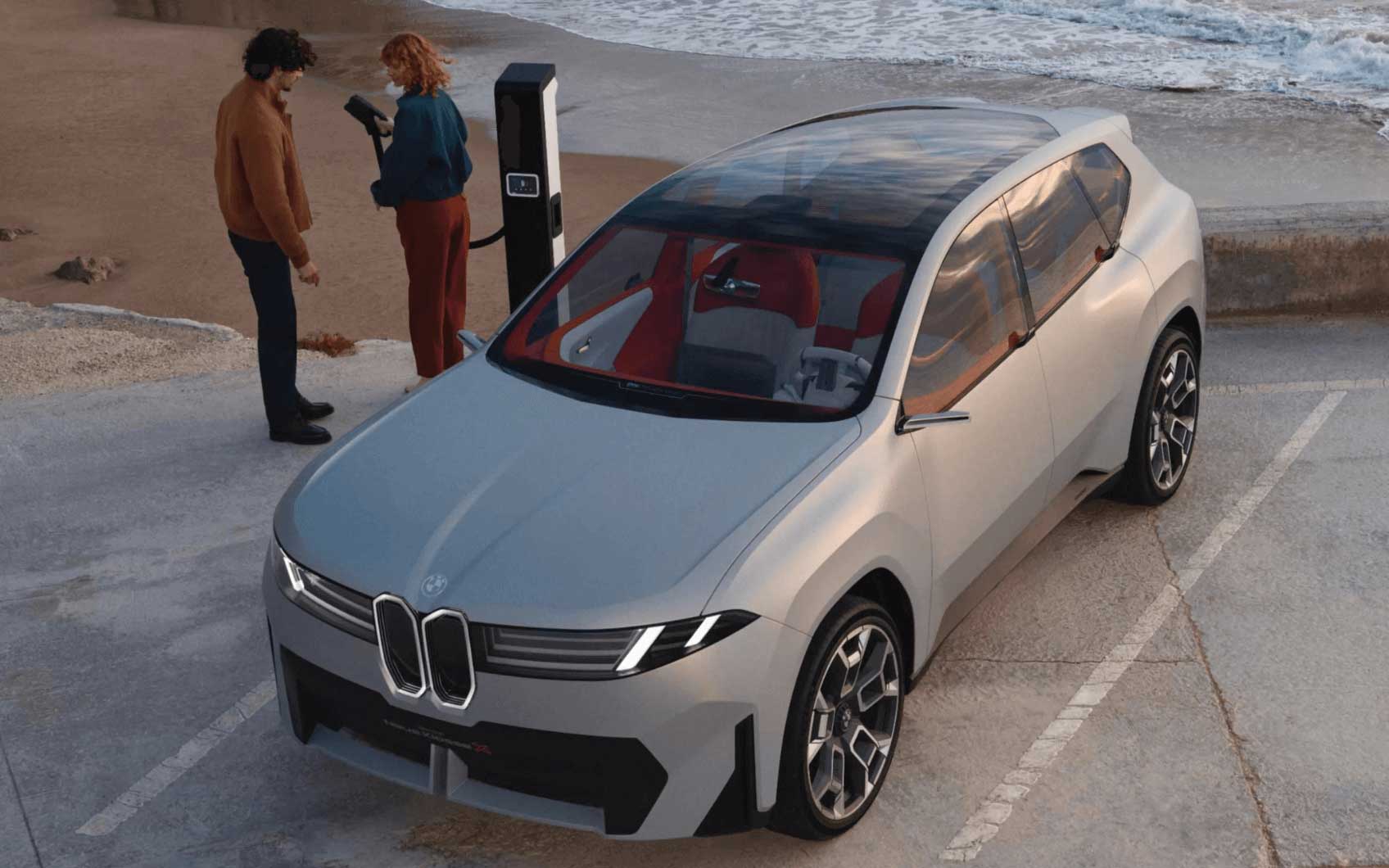 Vogelperspektive von dem BMW Vision Klasse X vor einer Ladesäule